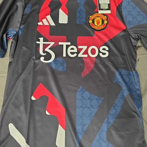 ADIDAS KID'S MANCHESTER UNITED 24/25 PRE-MATCH JERSEY SIZE 11-12 YEARS