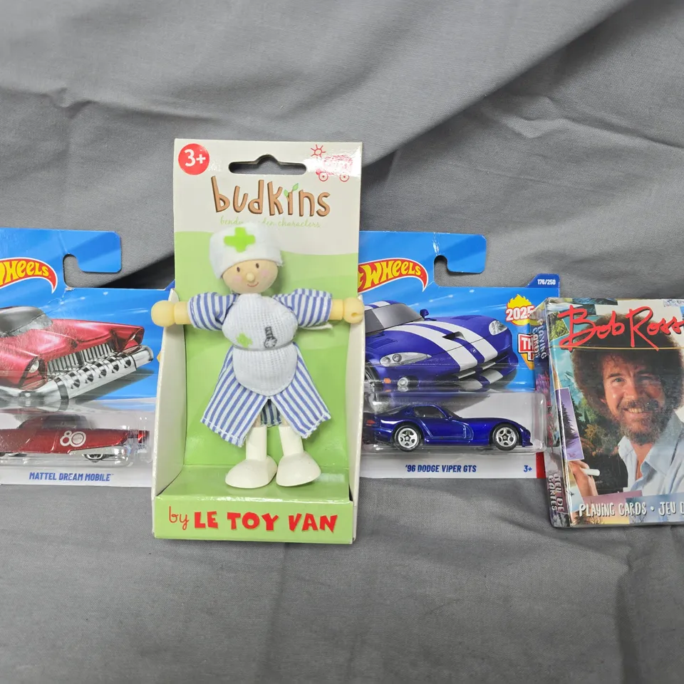 APPROXIMATELY 10 ASSORTED TOYS AND GAMES TO INCLUDE HOT WHEELS, BOB ROSS PLAYING CARDS, ETC