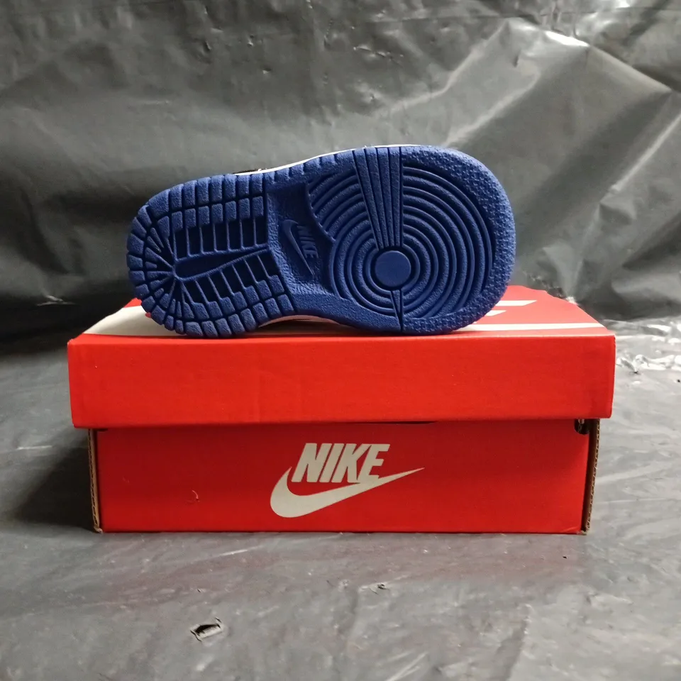 BOXED PAIR OF NIKE DUNK LOW INFANT TRAINERS IN WHITE/BLACK/BLUE SIZE UK 2.5