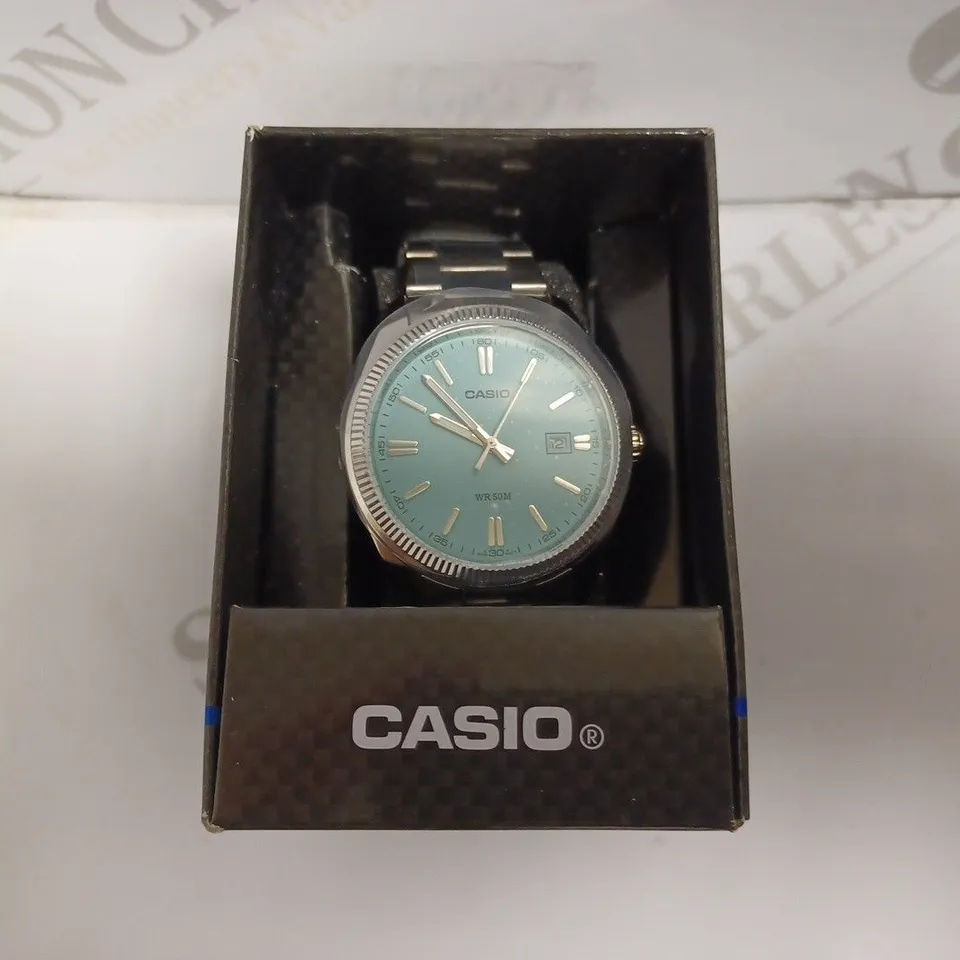 CASIO WATER RESISTANT WATCH WITH SILVER BRACELET STRAP
