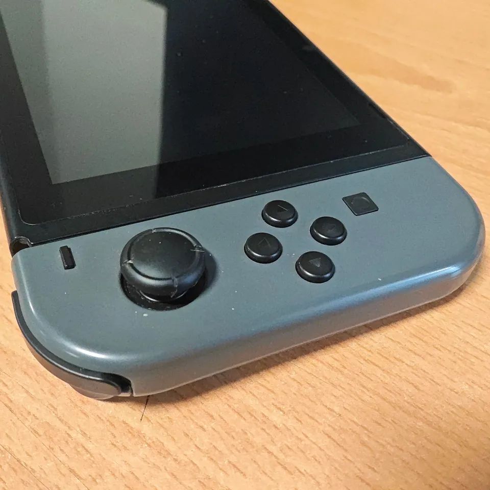 BOXED NINTENDO SWITCH HANDHELD GAMING CONSOLE WITH GREY JOY-CONS