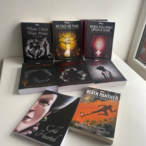 9 ASSORTED BOOKS TO INCLUDE: WHEN YOU WISH UPON A STAR, BLACK PANTHER, UNBIRTHDAY, WINTER SOLDIER, COLD HEARTED ETC