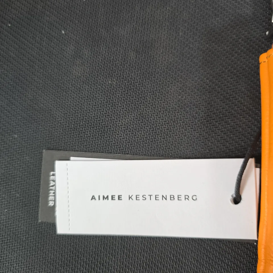 AIMEE KESTENBERG ORANGE LEATHER ZIP WALLET WITH WRIST STRAP
