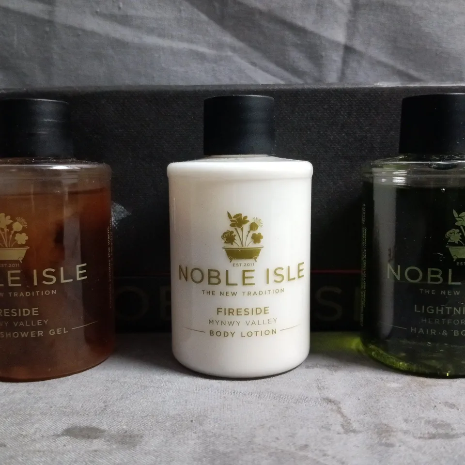 NOBLE ISLE FIRESIDE COLLECTION – TRIO OF TRAVEL-SIZE BATH & SHOWER GEL, BODY LOTION, & HAIR & BODY WASH