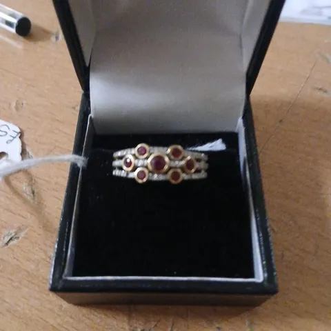 0.20CT DIAMOND & 0.4CT RUBY BEZEL SET BAND RING 9CT GOLD