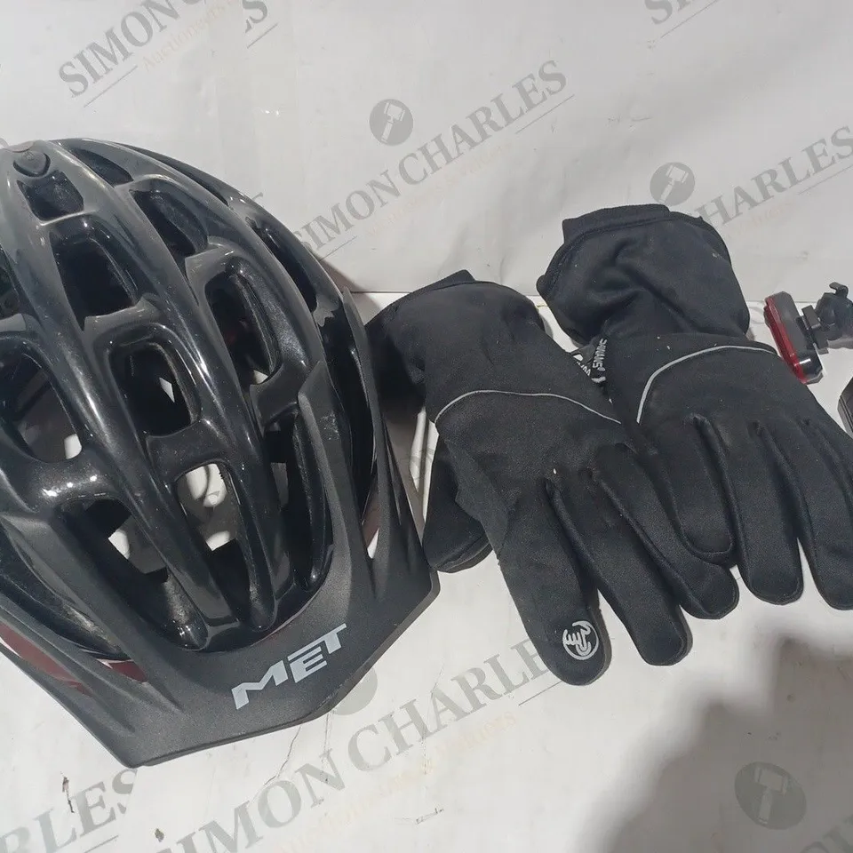 SMALL ASSORTMENT OF CYCLING GEAR TO INCLUDE HELMET, GLOVES, AND LIGHTS