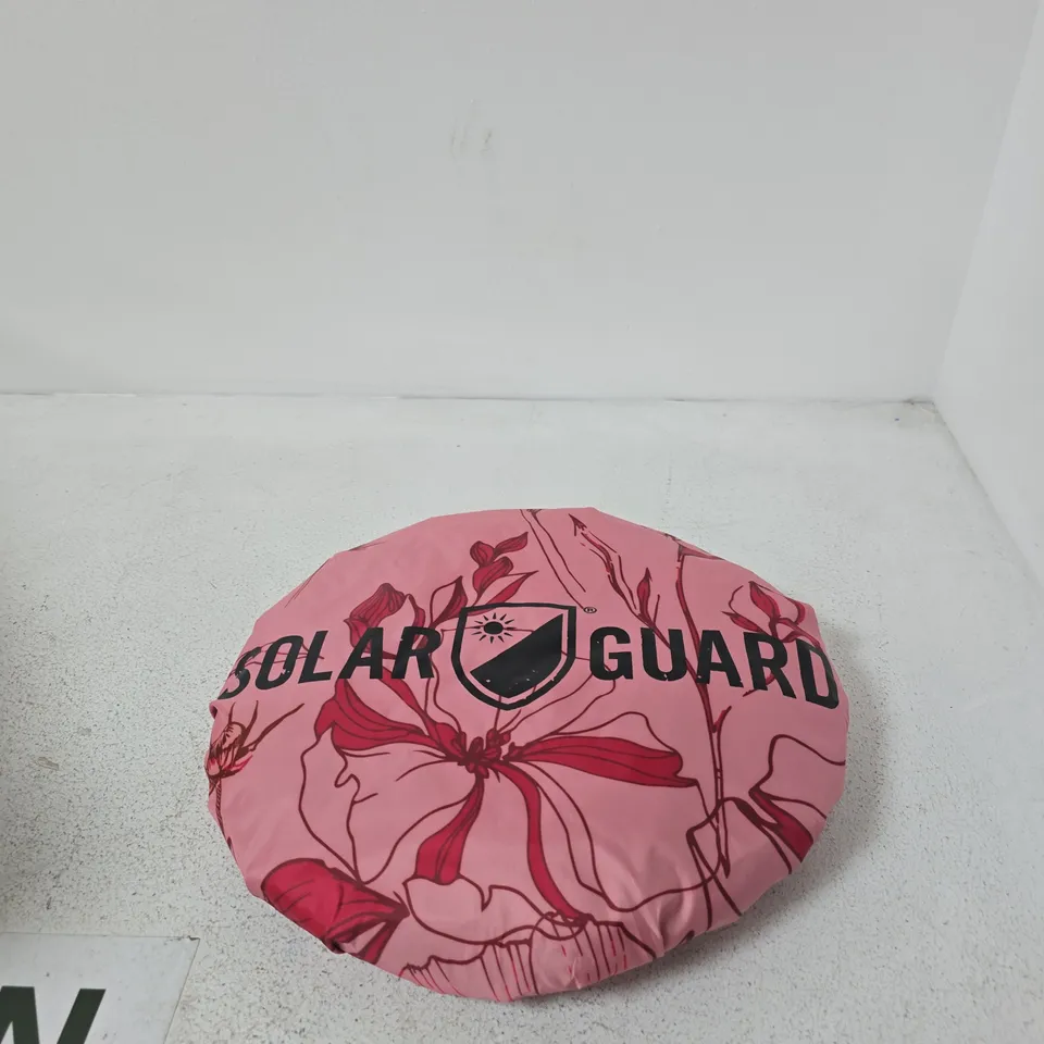 BOX OF APPROXIMATELY 7 SOLAR GUARD STEERING WHEEL COVER