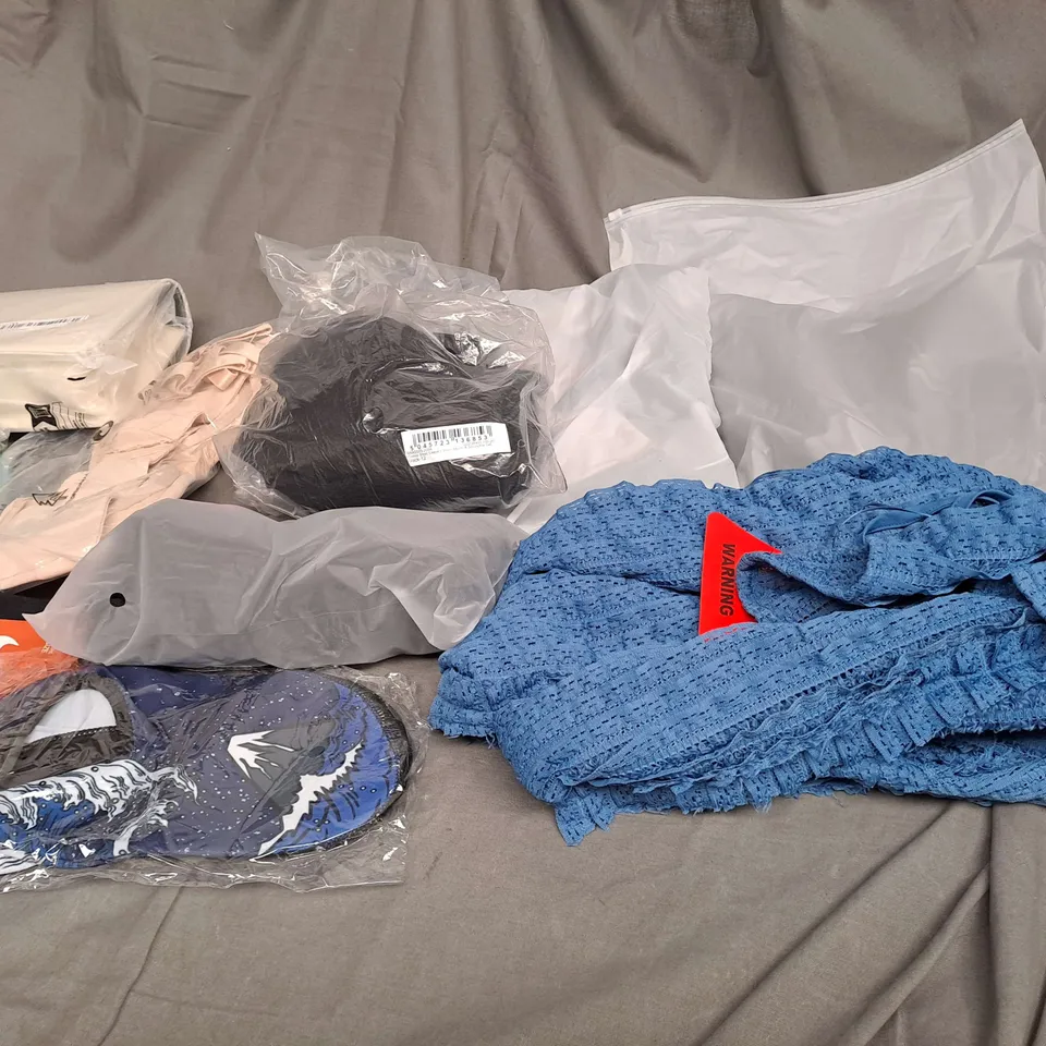 LARGE QAUNTIITY OF ASSORTED CLOTHING ITEMS IN VARIOUS STYLES, SIZES AND COLOURS