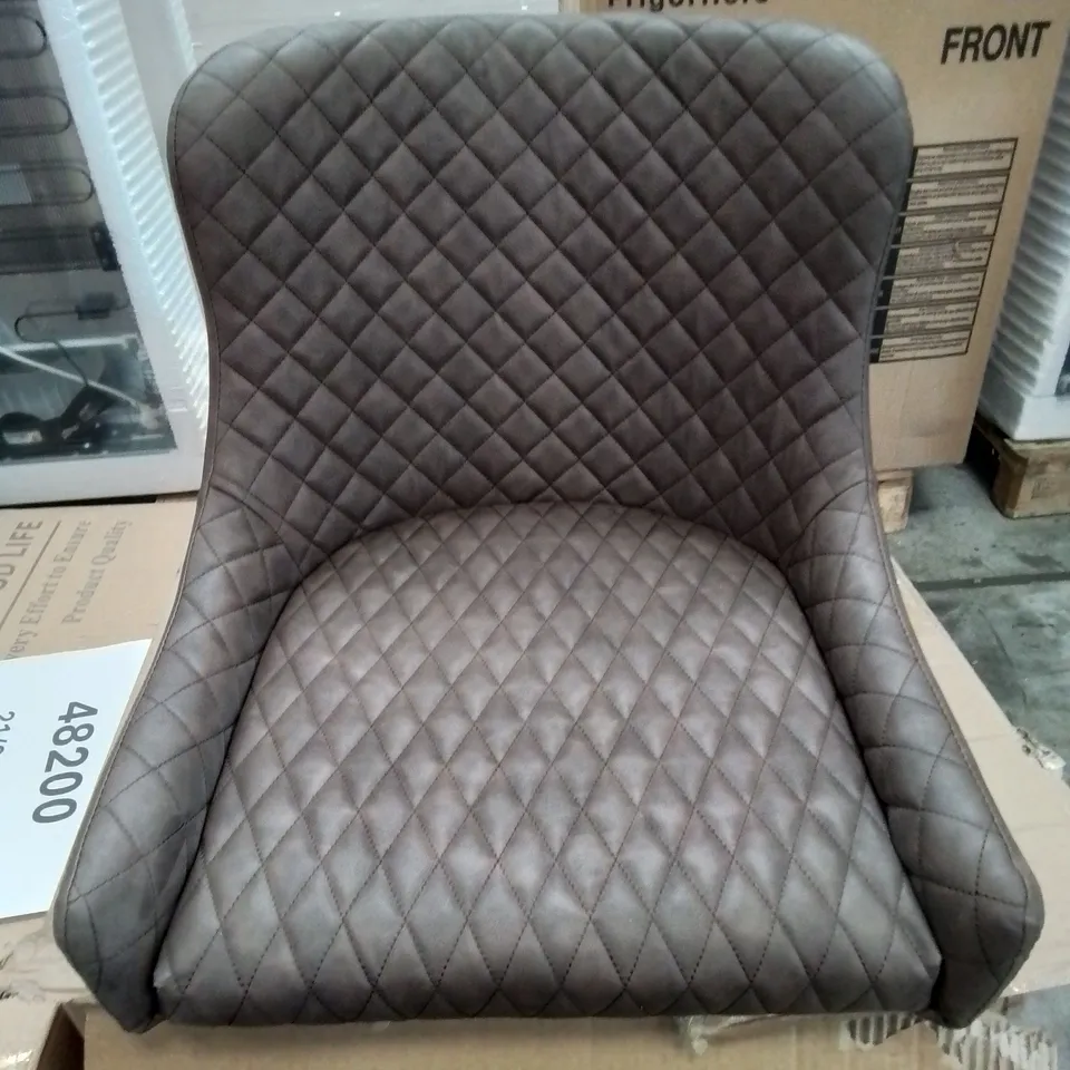 A BOXED PAIR OF BROWN FAUX LEATHER UPHOLSTERED SIDE/DINING CHAIRS