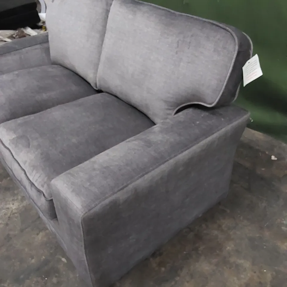 DESIGNER 2-SEATER UPHOLSTERED IN SOFT FABRIC 