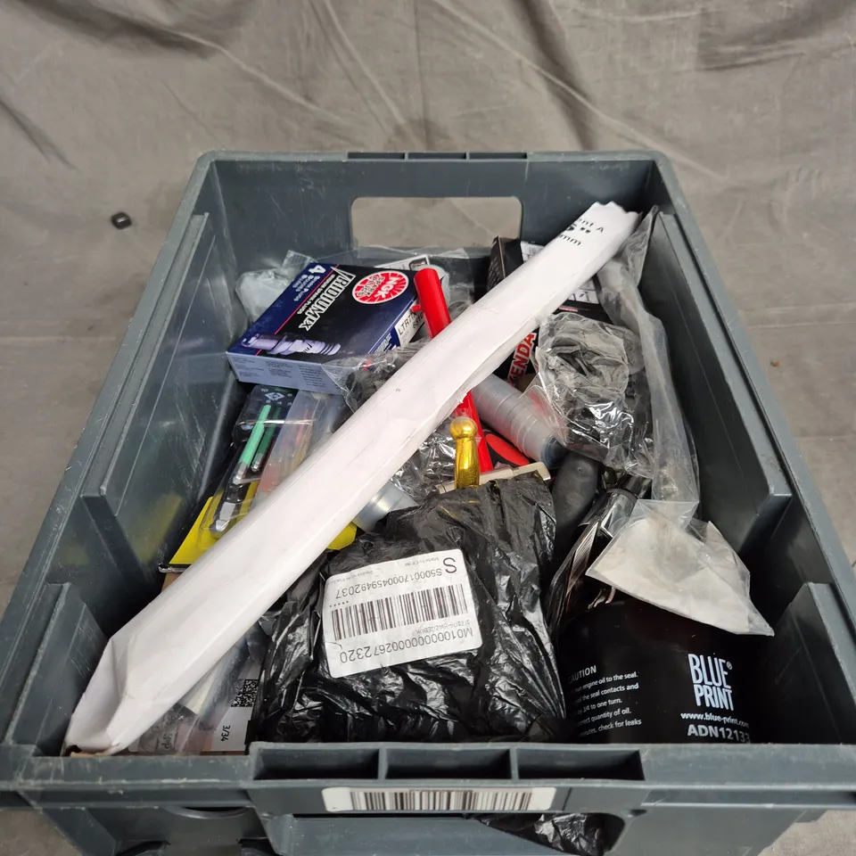 TOTE OF APPROXIMATELY. 15 ASSORTED CAR ITEMS TO INCLUDE BRAKE PADS , CLEAN CLOTHS , SPARK PLUGS AND TOOLS