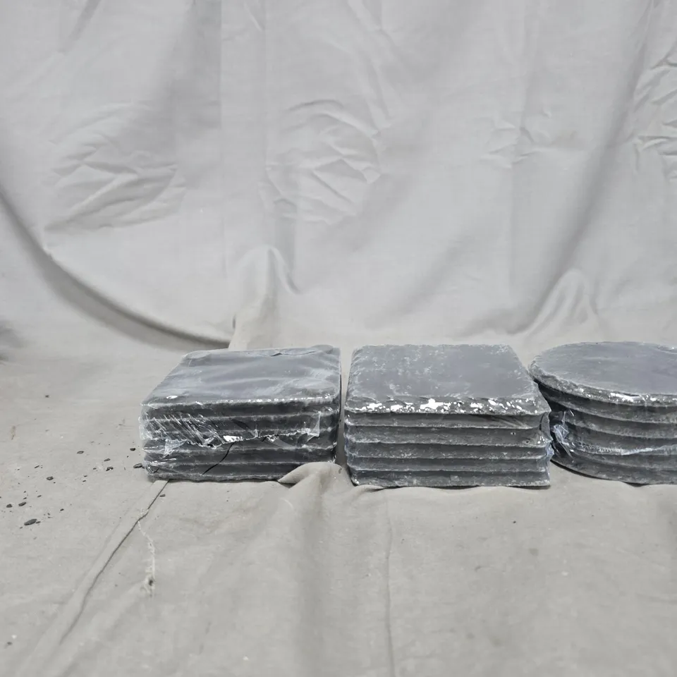 APPROXIMATELY 22 STONE COASTERS