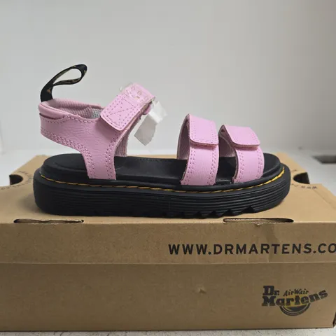 BOXED PAIR OF DR. MARTENS KLAIRE J ZEBRILUS KIDS SANDALS PALE PINK - UK 12