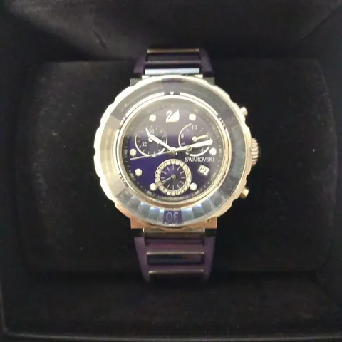 SWAROVSKI 1088675 STAINLESS STEEL 50M SWISS MADE WRIST WATCH AND PURPLE RUBBER STRAP 