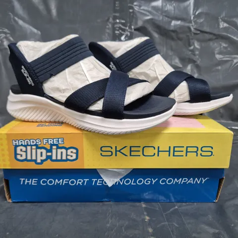 BOXED PAIR OF SKECHERS ULTRA FLEX OPEN TOE SANDALS IN NAVY SIZE 4