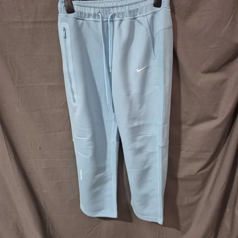 NIKE NOCTA MEN'S TRACK PANTS – LIGHT BLUE (FD8461-480), SIZE L