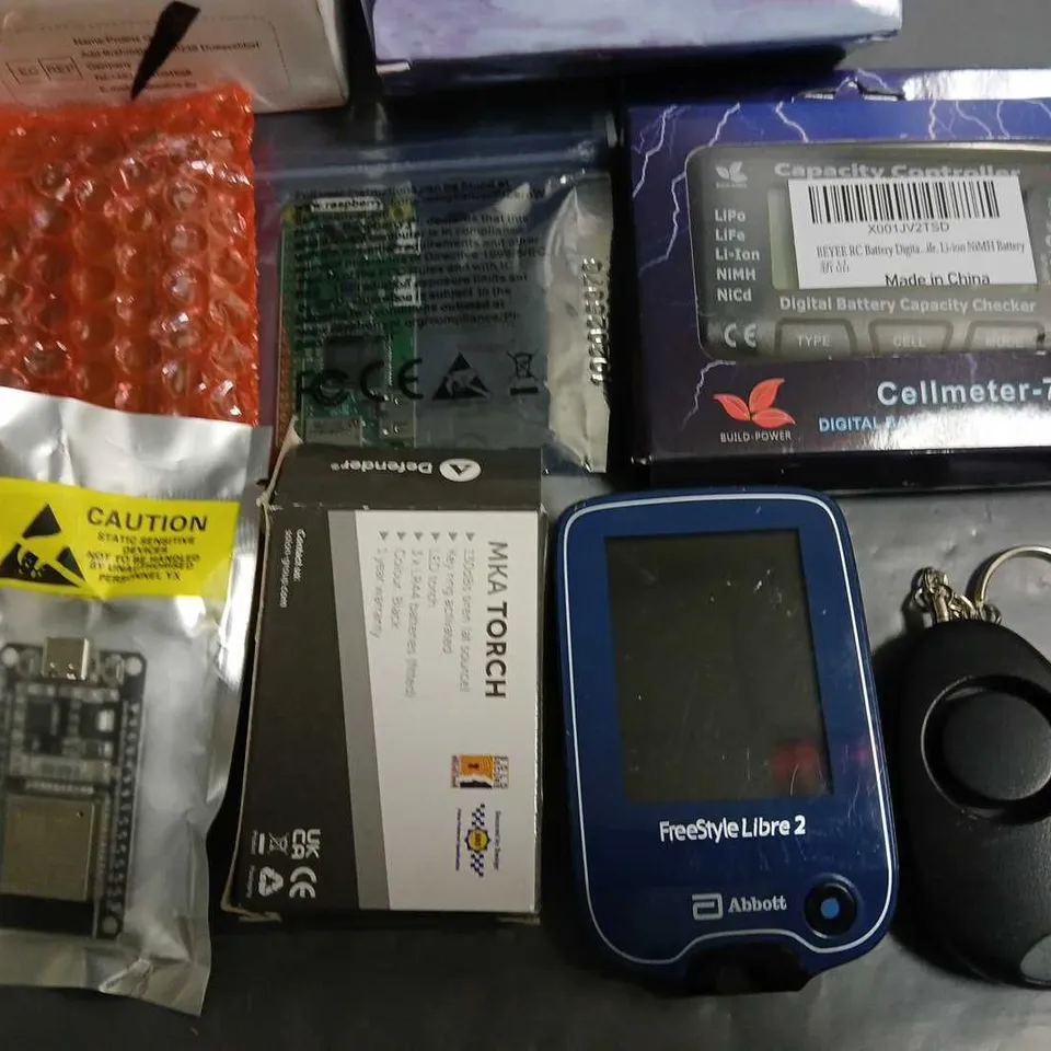 LOT OF 15 ASSORTED TECH ITEMS TO INCLUDESMART USB CHARHER, SSD ENCLOSURE DIGITAL BREATH ALCHOL TESTER