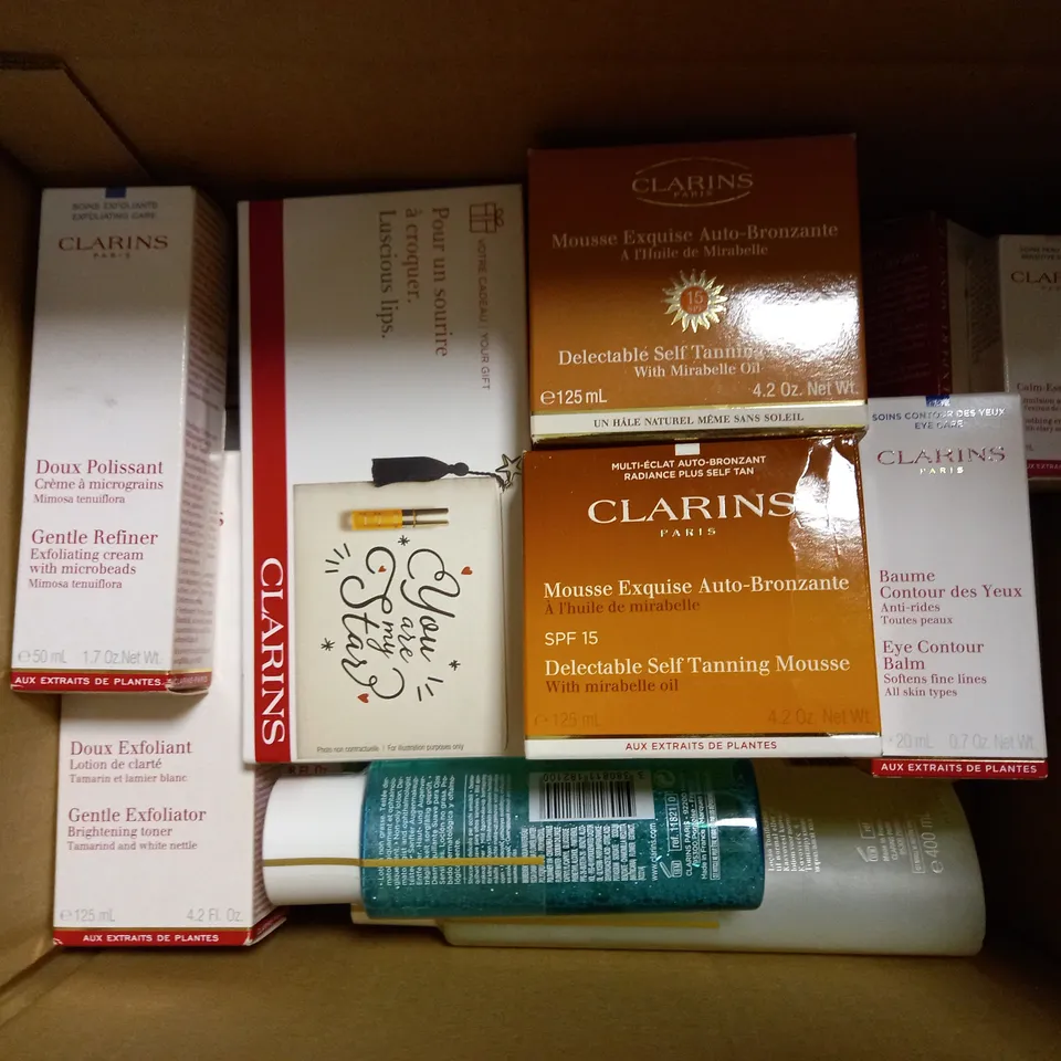 LOT OF APPROX 12 CLARINS PARIS PRODUCTS INCLUDING GENTLE EYE MAKE UP REMOVER, BODY SHAPING SUPPLEMENT, TONING LOTION 