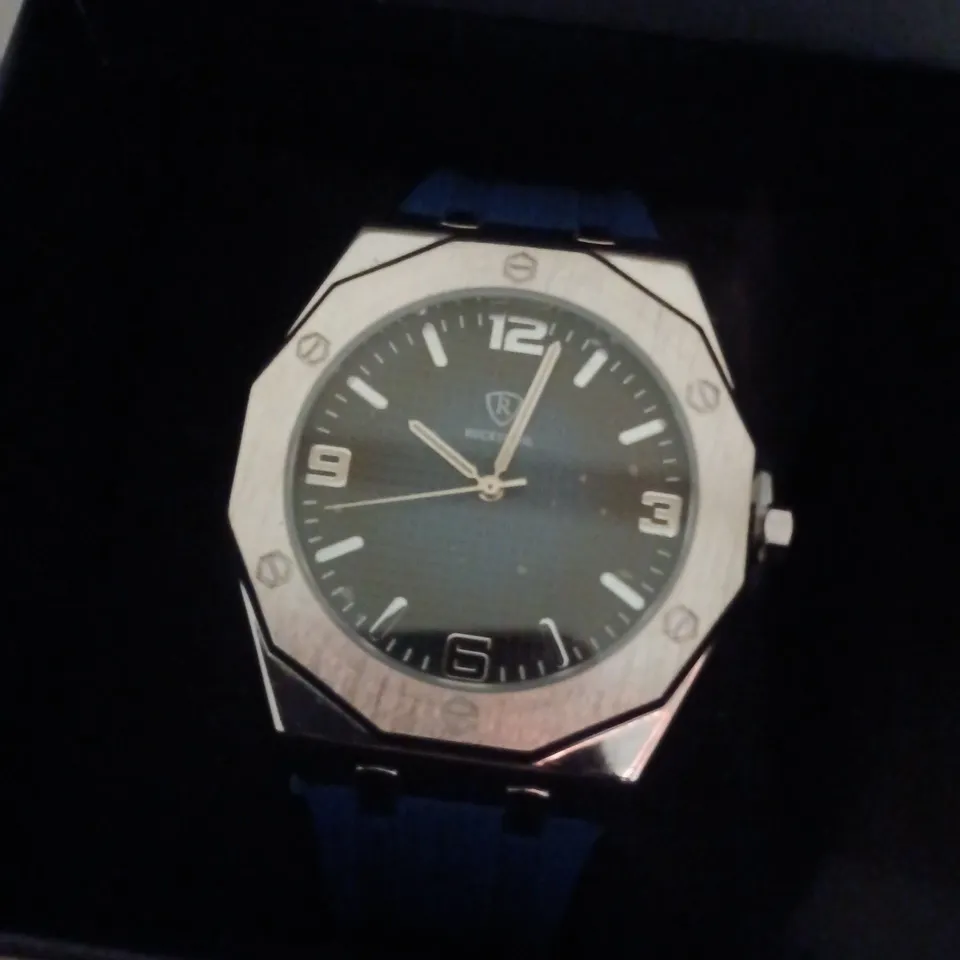 RUCKSTUHL SILVER COLOUR WRISTWATCH WITH NAVY RUBBER STRAP