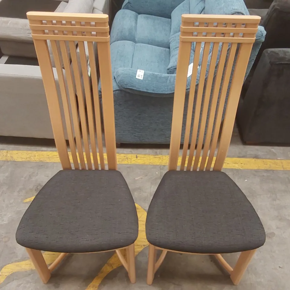 PAIR OF DESIGNER WOODEN HIGH BACK DINING CHAIRS WITH UPHOLSTERED PADDED SEATS