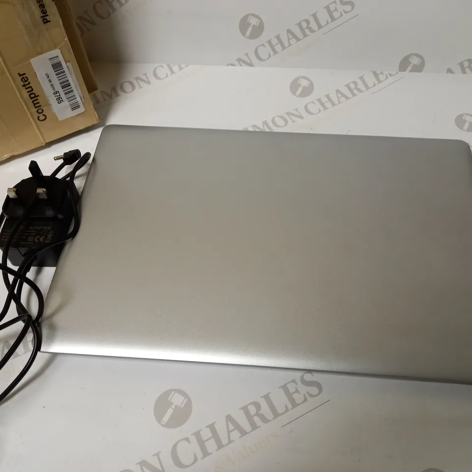 UNBRANDED SILVER LAPTOP WITH POWER LEAD APPROX. 15" SCREEN