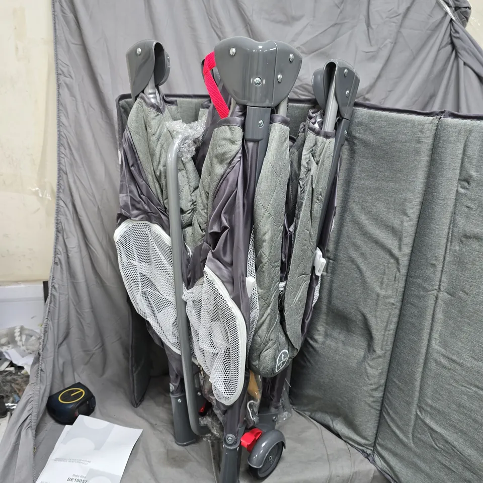 FOLDED BABY BED  INCLUDES BE10057 MANUAL