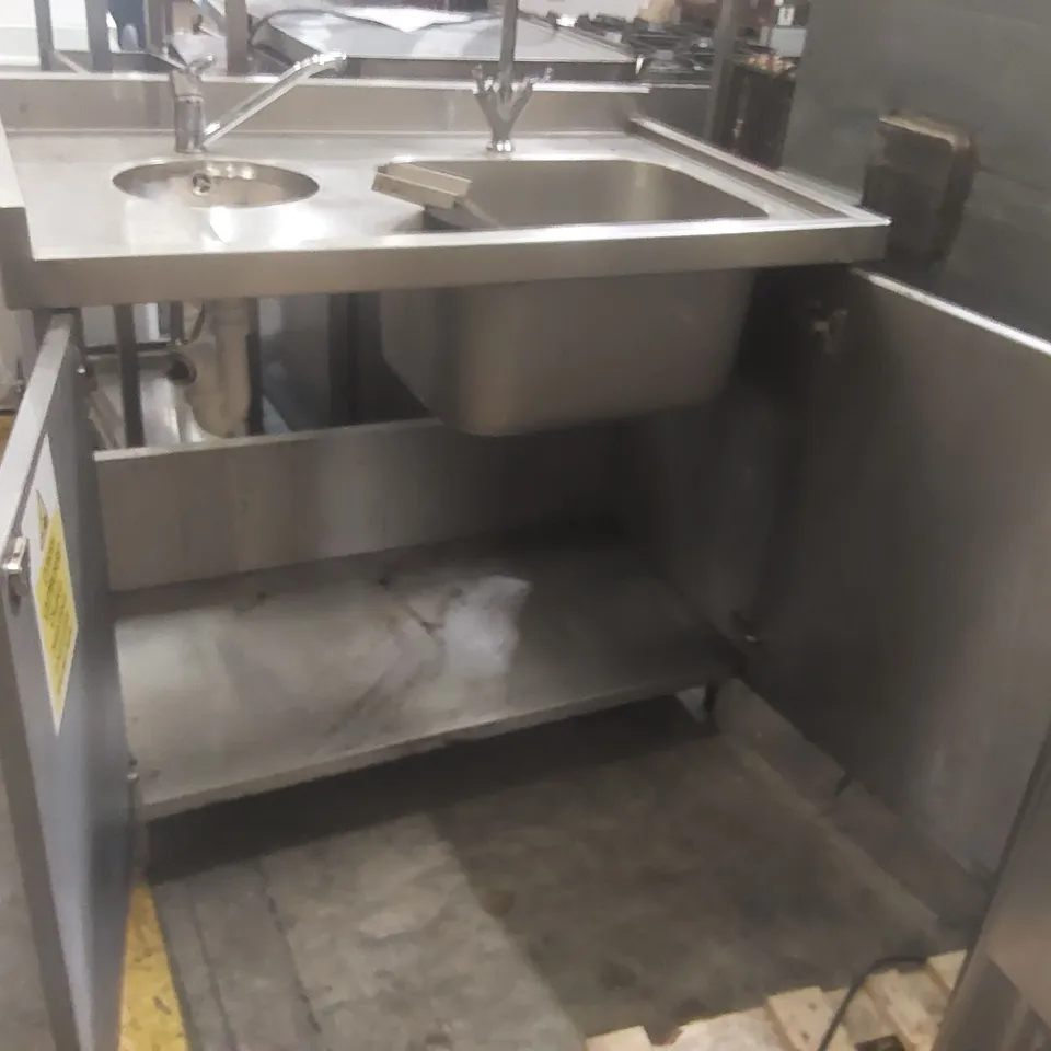 STAINLESS STEEL SINK UNIT WITH AN INTEGRATED BASE CABINET AND DUAL BASINS
