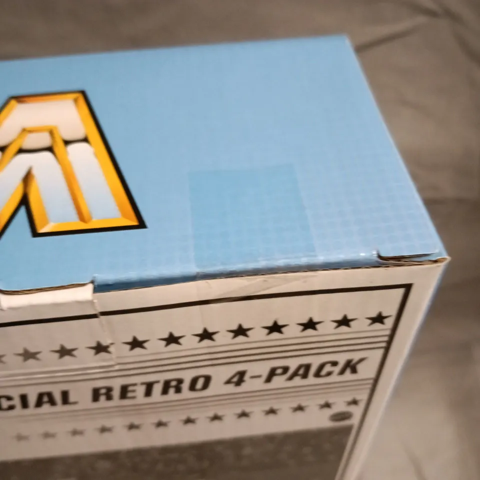 UNOPENED WWE OFFICIAL RETRO 4-PACK