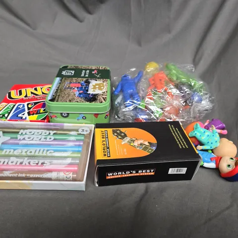 APPROXIMATELY 10 ASSORTED TOYS AND GAMES TO INCLUDE COCOMELON, PENS AND UNO CARDS