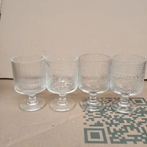 SET OF 4 CLEAR GLASS STEMWARE WITH DECORATIVE TEXTURES