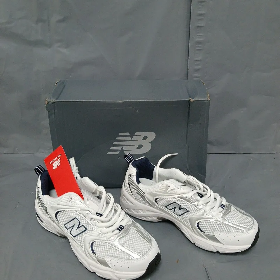 BOXED PAIR OF 530 RUNNING METALIC/NAVY UK 6