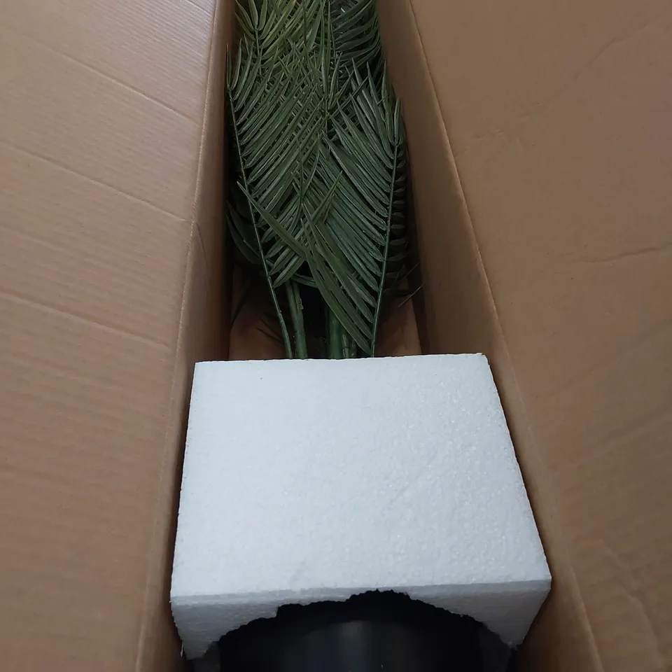 TWO BOXED FLOURESCENT ARTIFICIAL PALM PLANTS