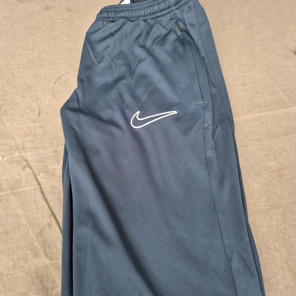 NIKE ACADEMY TRACKSUIT BOTTOMS - SIZE M 