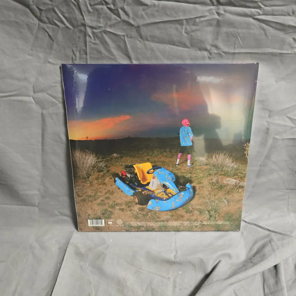 CHERRY BOMB - TYLER THE CREATOR DELUXE GATEFOLD VINYL LP WITH 8-PAGE BOOKLET (TRANSLUCENT RED VINYL)