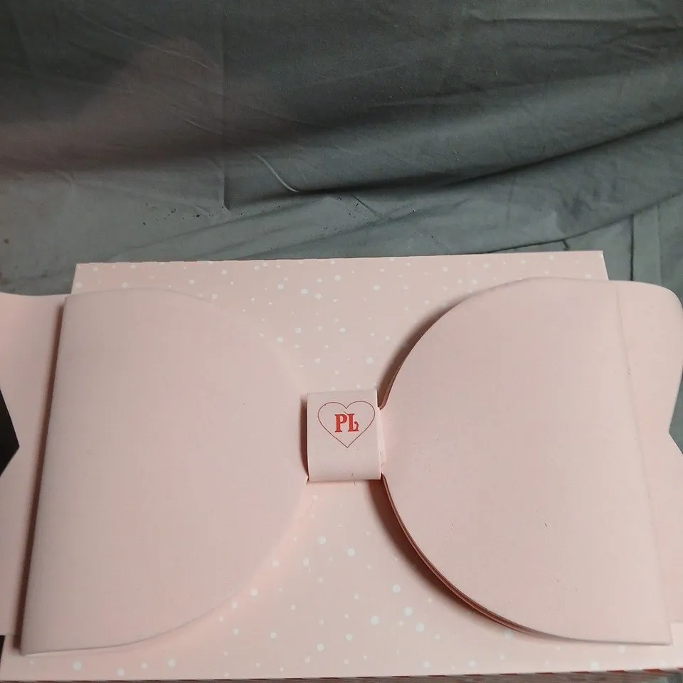 PLOUISE GIFT BOX OF ASSORTED BODY AND BEAUTY PRODUCTS WITH PINK BOW