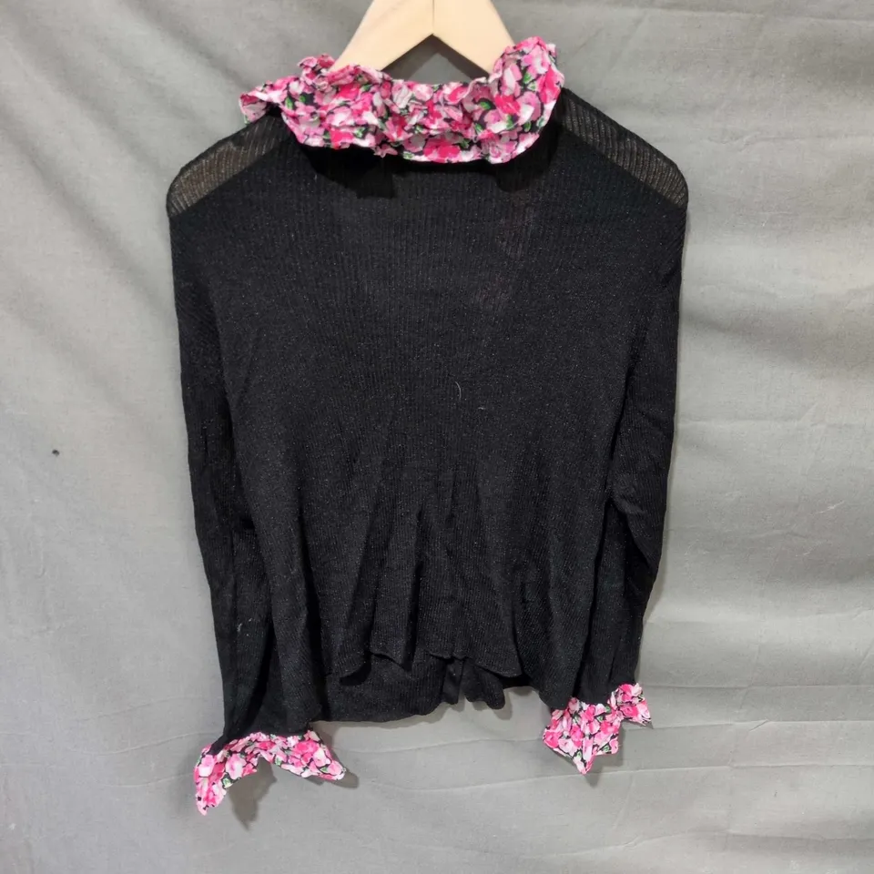 RIXO BLACK KNIT CARDIGAN WITH PINK FLORAL RUFFLE COLLAR & CUFFS – UK 14 (EU 42, US 10)