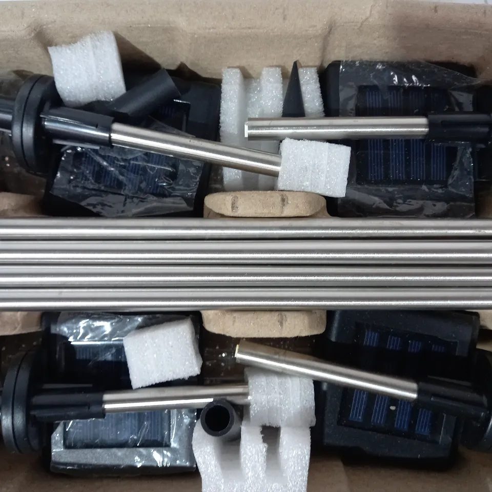 BOXED BELL & HOWELL GLIMMER STICKS SET OF 4 SOLAR PATHWAY LIGHTS