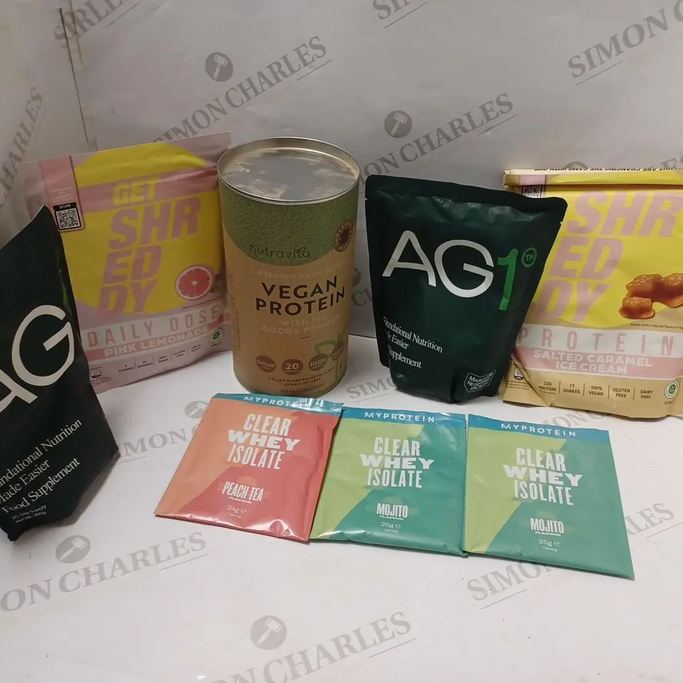 LOT OF APPROXMATELY 8 ITEMS TO INCLUDE 2 AG1 FOUNDATIONAL NUTRITION FOOD SUPPLEMENT (360g), NUTRAVITA VEGAN PROTEIN WITH 15% COCOA POWDER FOOD SUPPLEMENT (750g), GET SHREDY PROTEIN SALTED CARAMEL ICE 