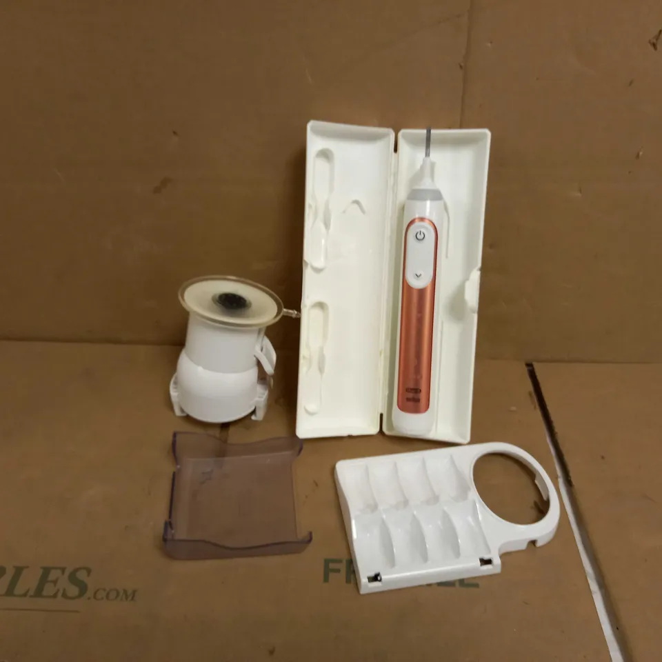 BRAUN ORAL-B TOOTHBRUSH WITH WALL ATTACHMENT
