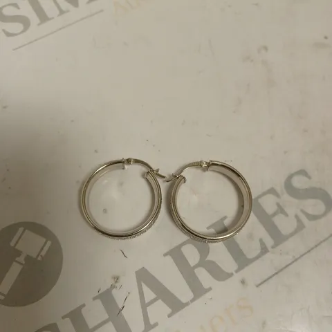 FAITH AND BROWN CATWALK STERLING SILVER STARDUST HOOPED EARRING.