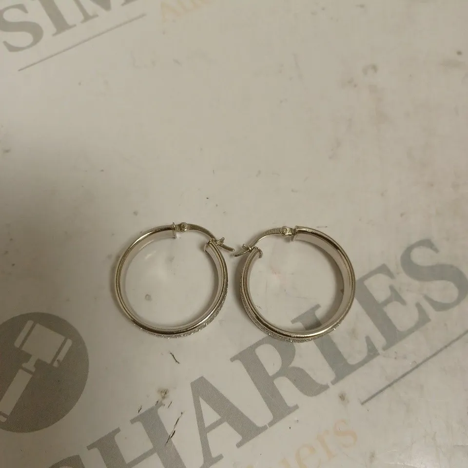 FAITH AND BROWN CATWALK STERLING SILVER STARDUST HOOPED EARRING. 