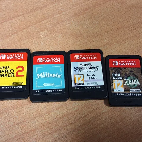 LOT OF 4 ASSORTED UNBOXED NINTENDO SWITCH GAMES TO INCLUDE ZELDA, MARIO AND MIITOPIA