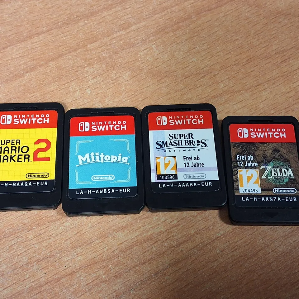LOT OF 4 ASSORTED UNBOXED NINTENDO SWITCH GAMES TO INCLUDE ZELDA, MARIO AND MIITOPIA