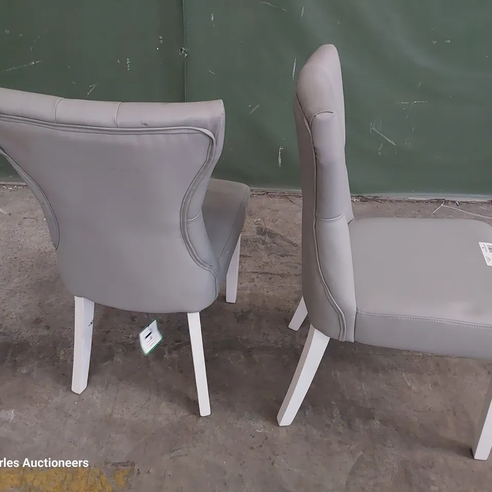 PAIR OF UPHOLSTERED BUTTONED BACK DINING CHAIRS GREY PU ON WHITE PAINTED LEGS 