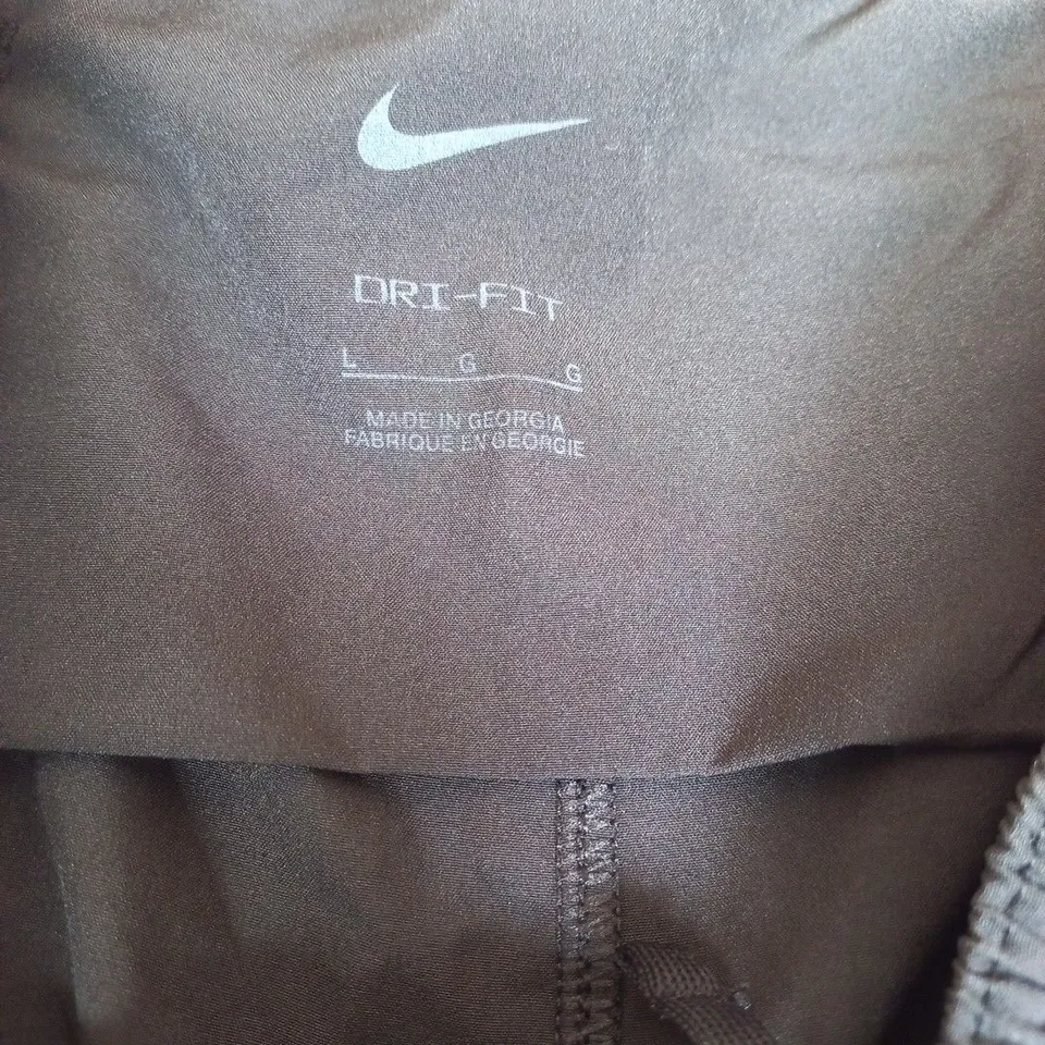NIKE DRI-FIT TRACK PANTS – NAVY WITH LIGHT BLUE SIDE STRIPES SIZE L