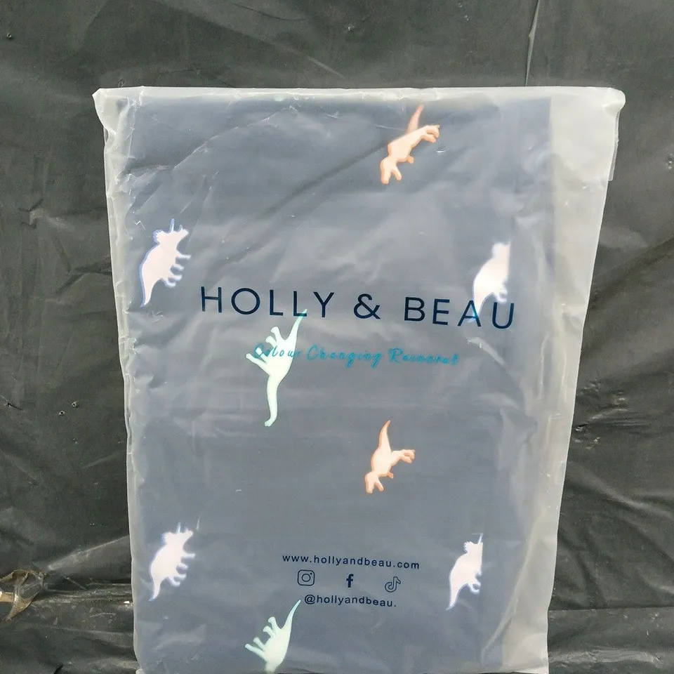 BAGGED HOLLY AND BEAU DINOSAUR RAINCOAT - SIZE 5/6 - COLOUR CHANGING