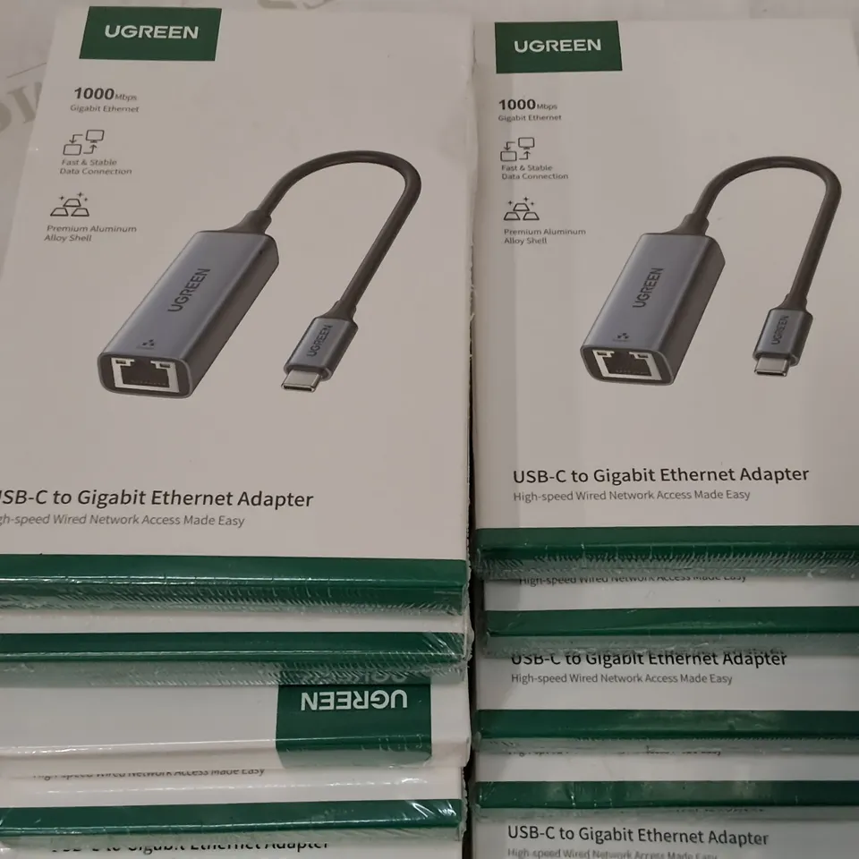 LOT OF ASSORTED ITEMS TO INCLUDE UGREEN USB-C TO ETHERNET CABLES, LIGHTNING CABLES AND TV REMOTES