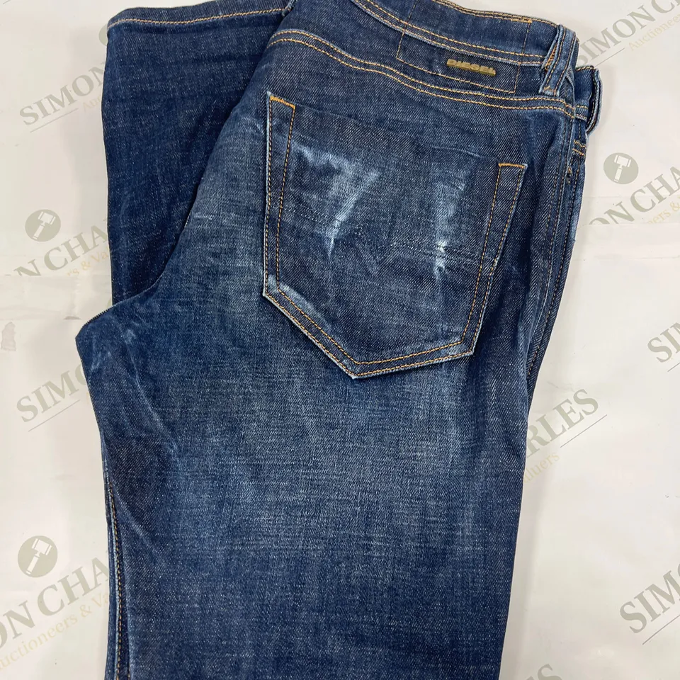 DIESEL TEPPHAR JEANS IN BLUE SIZE 32