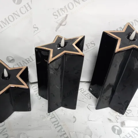 HOME REFLECTIONS CERAMIC STAR PRE-LIT CANDLES - BLACK