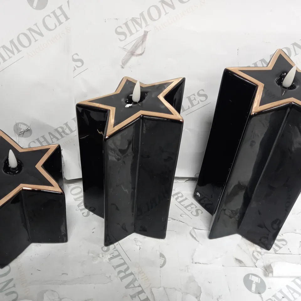HOME REFLECTIONS CERAMIC STAR PRE-LIT CANDLES - BLACK